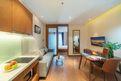 Queen Room with Balcony — DHTS Business Hotel & Apartment